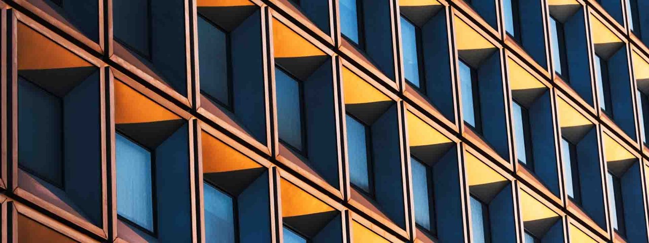 sunlit office building windows