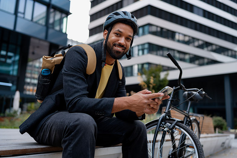 Person in urban setting with bike