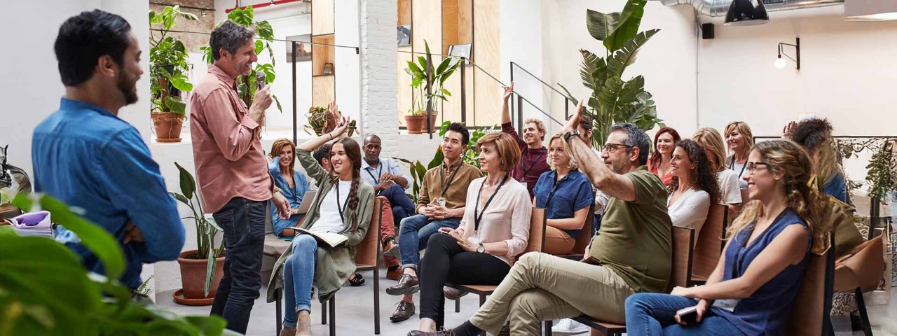 people sitting in a presentation