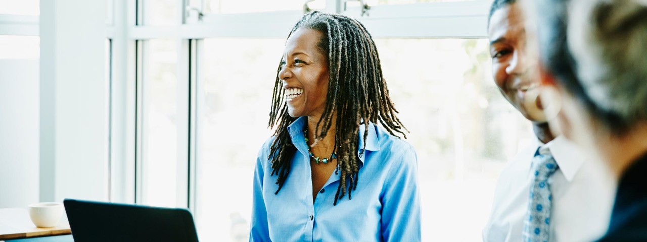 person wearing scarf looking at camera